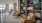 community area upstairs with chairs and open spaces beside large shelves
