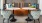 community area with accent colored furniture and areas for seating and relaxing
